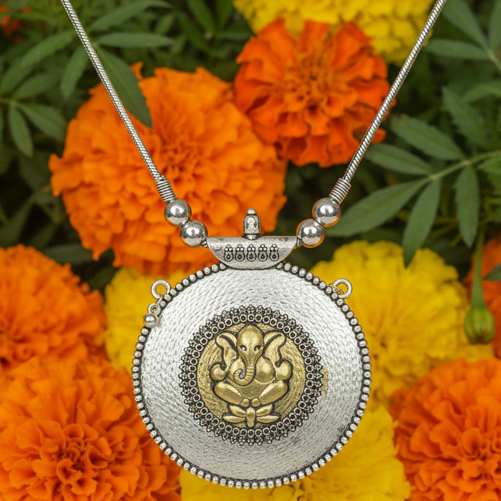 Decorative hairpin with intricate design on a dark background