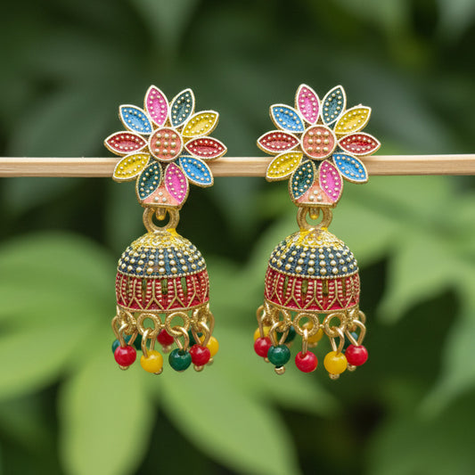 Colorful floral earrings on a black background