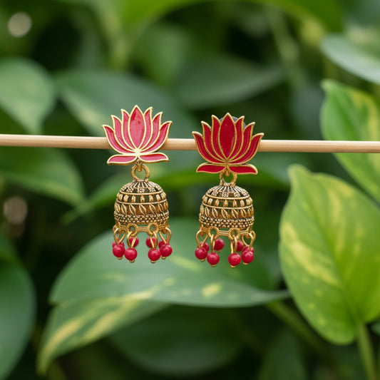 Decorative hairpin with red floral and gold elements on a gray background